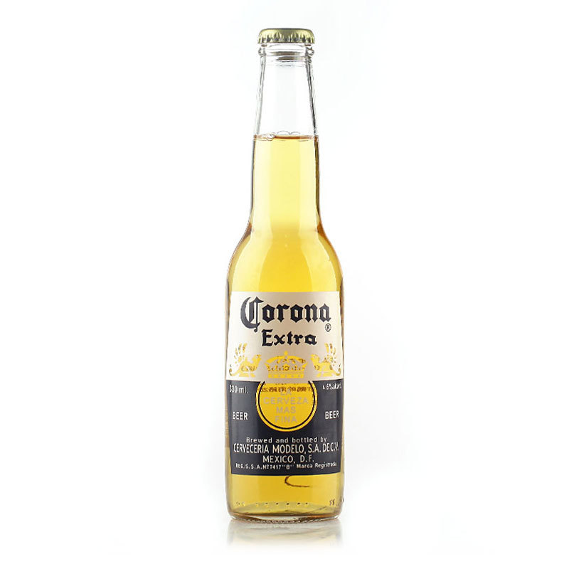 A bottle of Corona Extra beer with a lime wedge inside the neck.